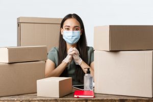 Small business owners, e-commerce and covid-19 preventing virus concept. Successful asian