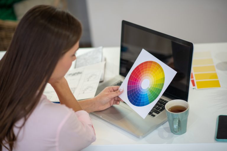 Close up of a color palette in female hands